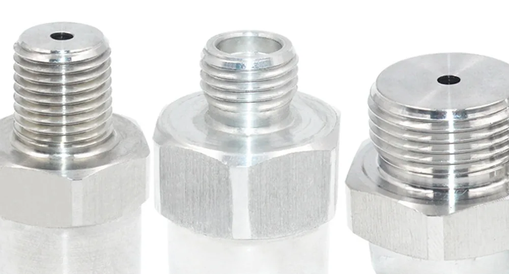 Representative machined pressure and sensor housings